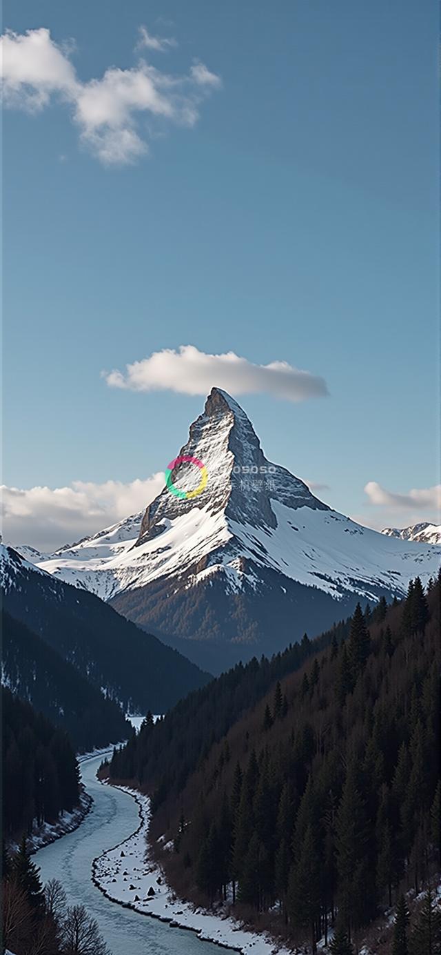 雪覆盖的马特洪峰壮丽全景：河流蜿蜒穿越山谷，白雪皑皑的山峦映衬晴空